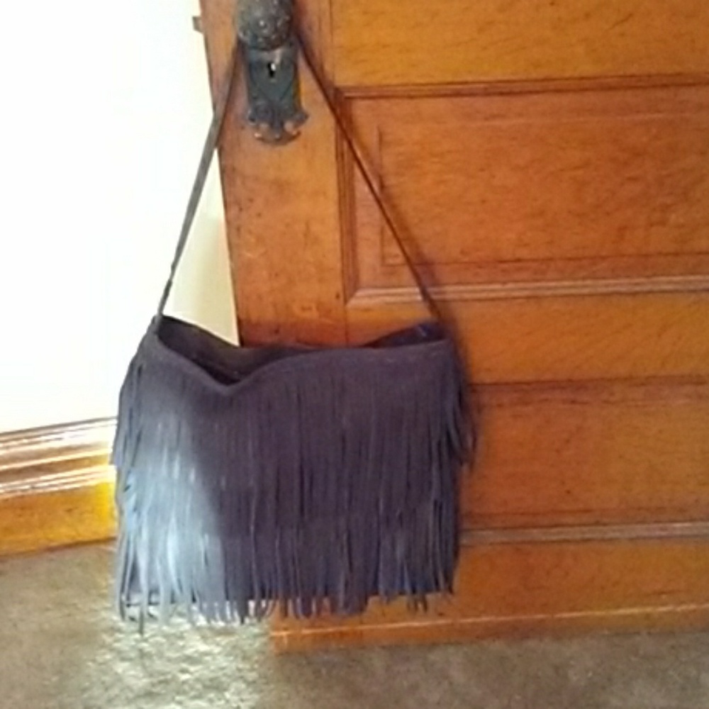 Camila Alves Muxo handbag